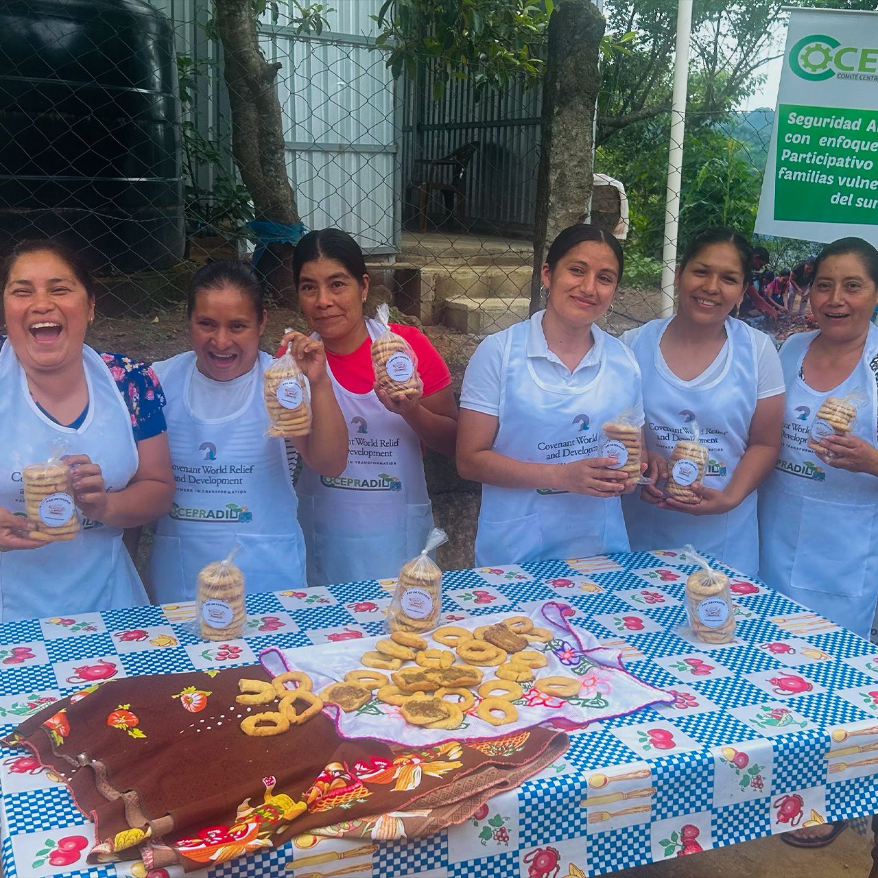 Women of Honduras showing baked goods